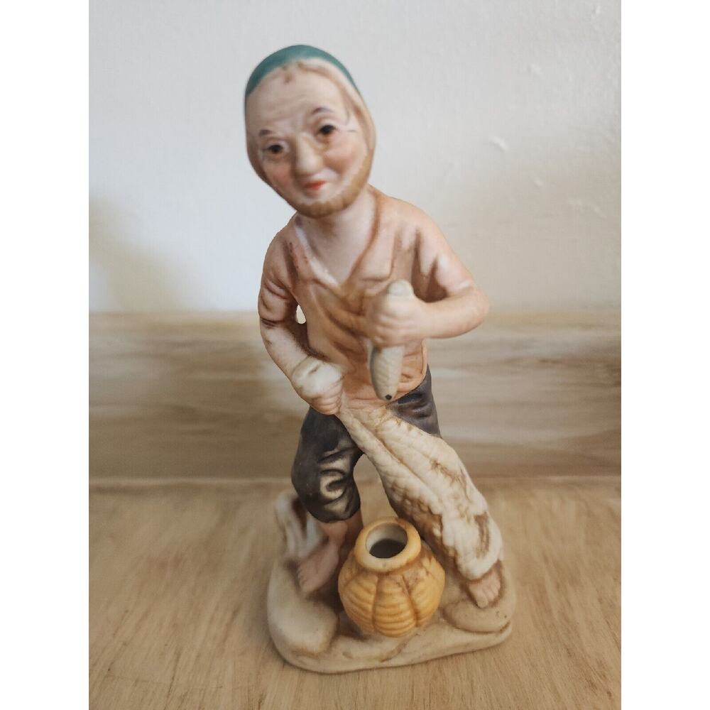 Vintage Porcelain Fisherman Figurine Holding Fish 6 1/4 High